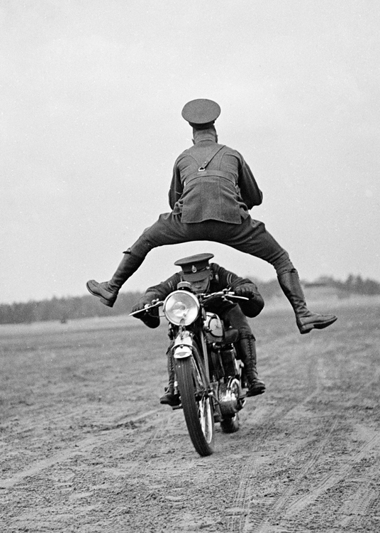 Man leaping motorcycle Man leaping motorcycle