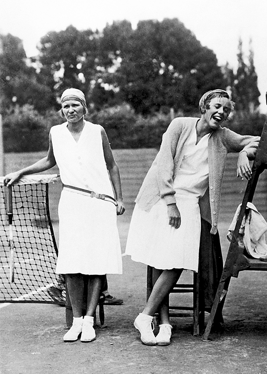 Women on tennis court Women on tennis court