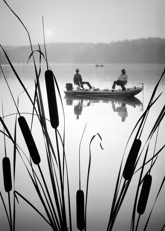 Two men on fishing boat Two men on fishing boat