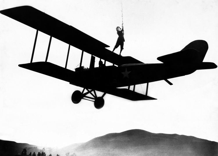 Stuntwoman on plane Stuntwoman on plane