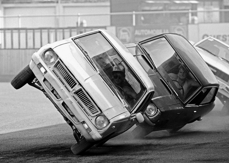 Racing cars tilting Racing cars tilting