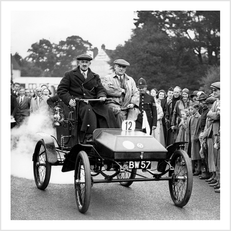 Two men in vintage car (square) Two men in vintage car (square)
