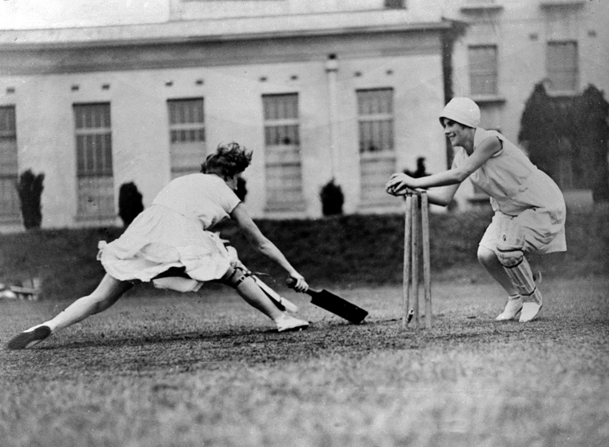 Women playing cricket Women playing cricket
