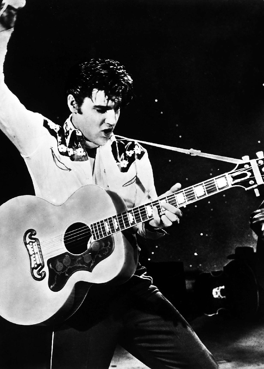 Elvis and guitar in King Creole Elvis and guitar in King Creole