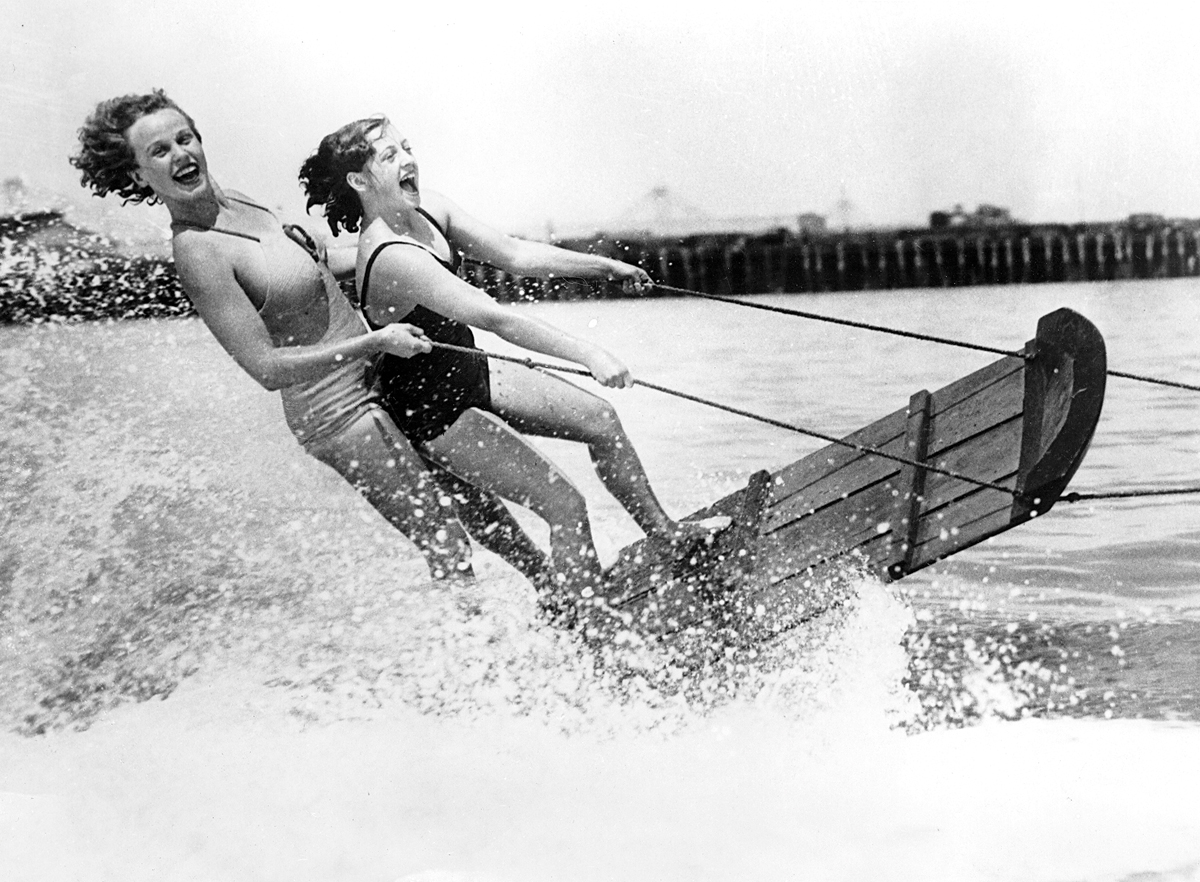 Two girls waterskiing Two girls waterskiing