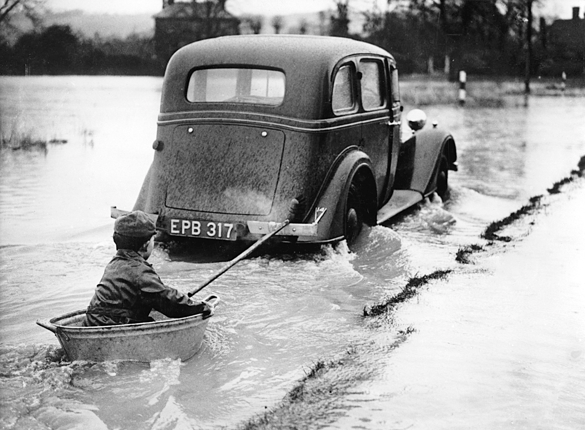 Getting a tow through the floods Getting a tow through the floods